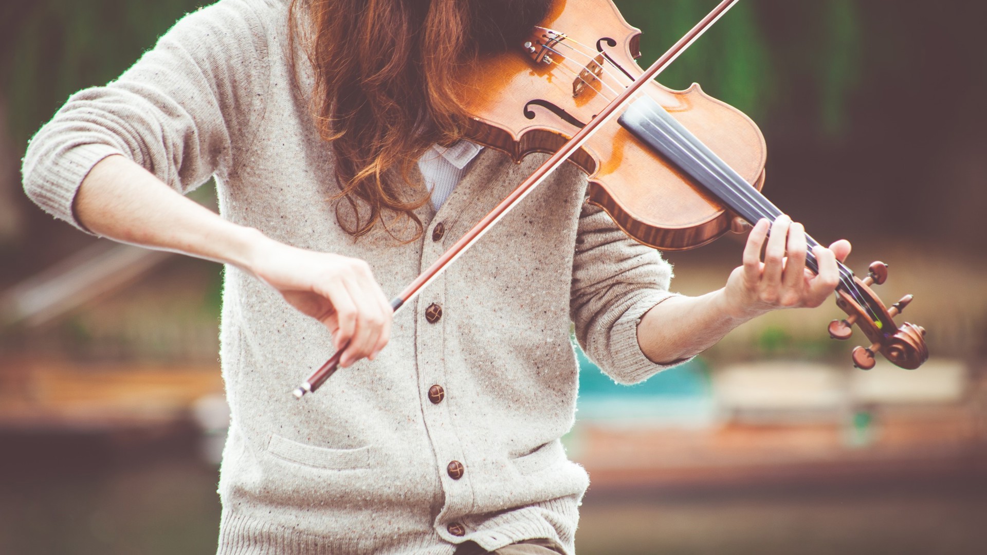 Girl playing an instrument